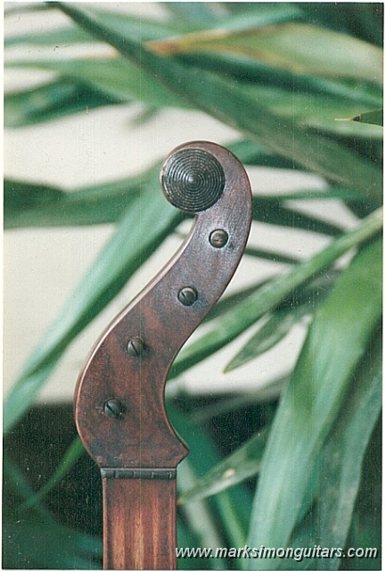 boucherheadbig.jpg - Color was derived from period old red bricks finely ground up and lampblack with a french polish. The worn areas on the fingerboard were replicated to simulate age.